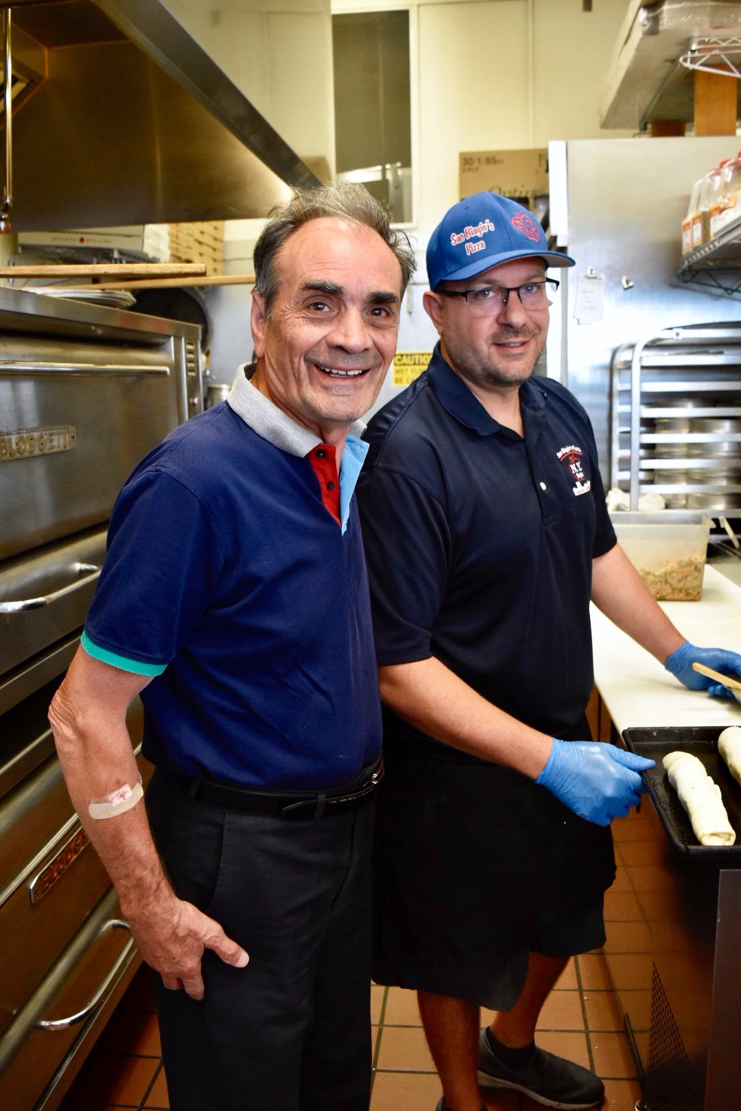 photo of Owner of San Biagio's Pizza with Son